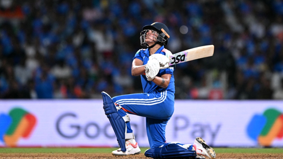 India batter in blue at the crease